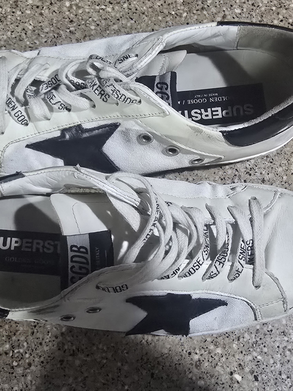 Golden Goose White Sneakers with Black Star Accent
